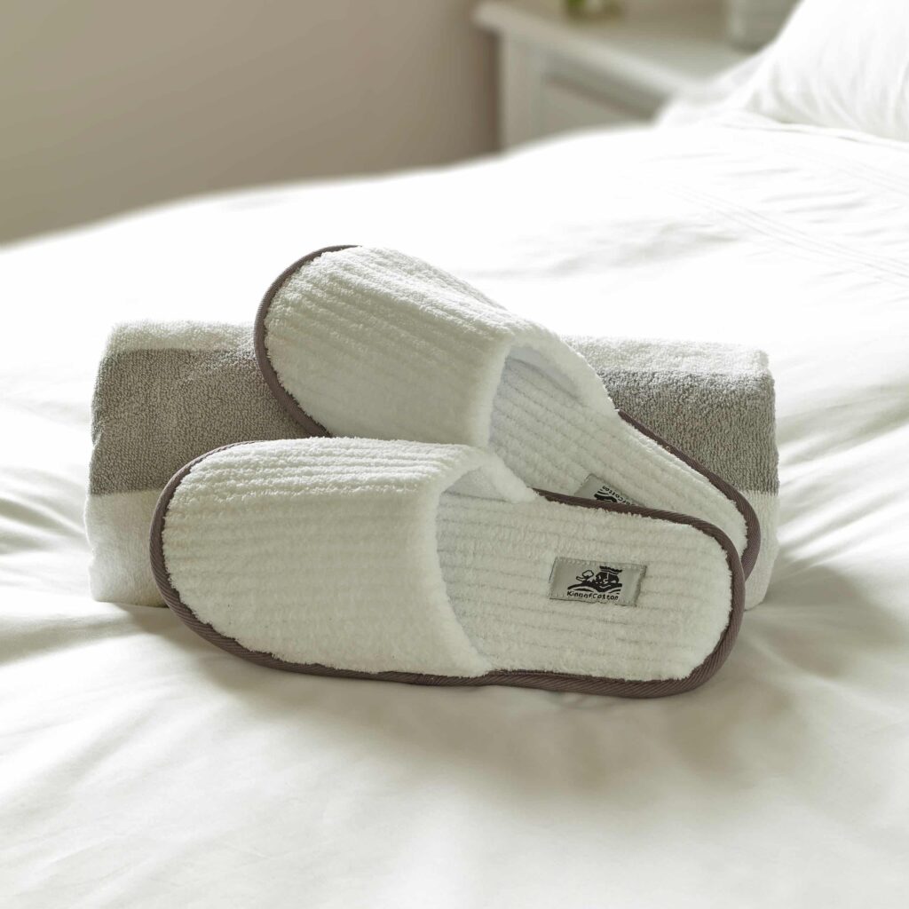 King of Cotton slippers and towel as a gift