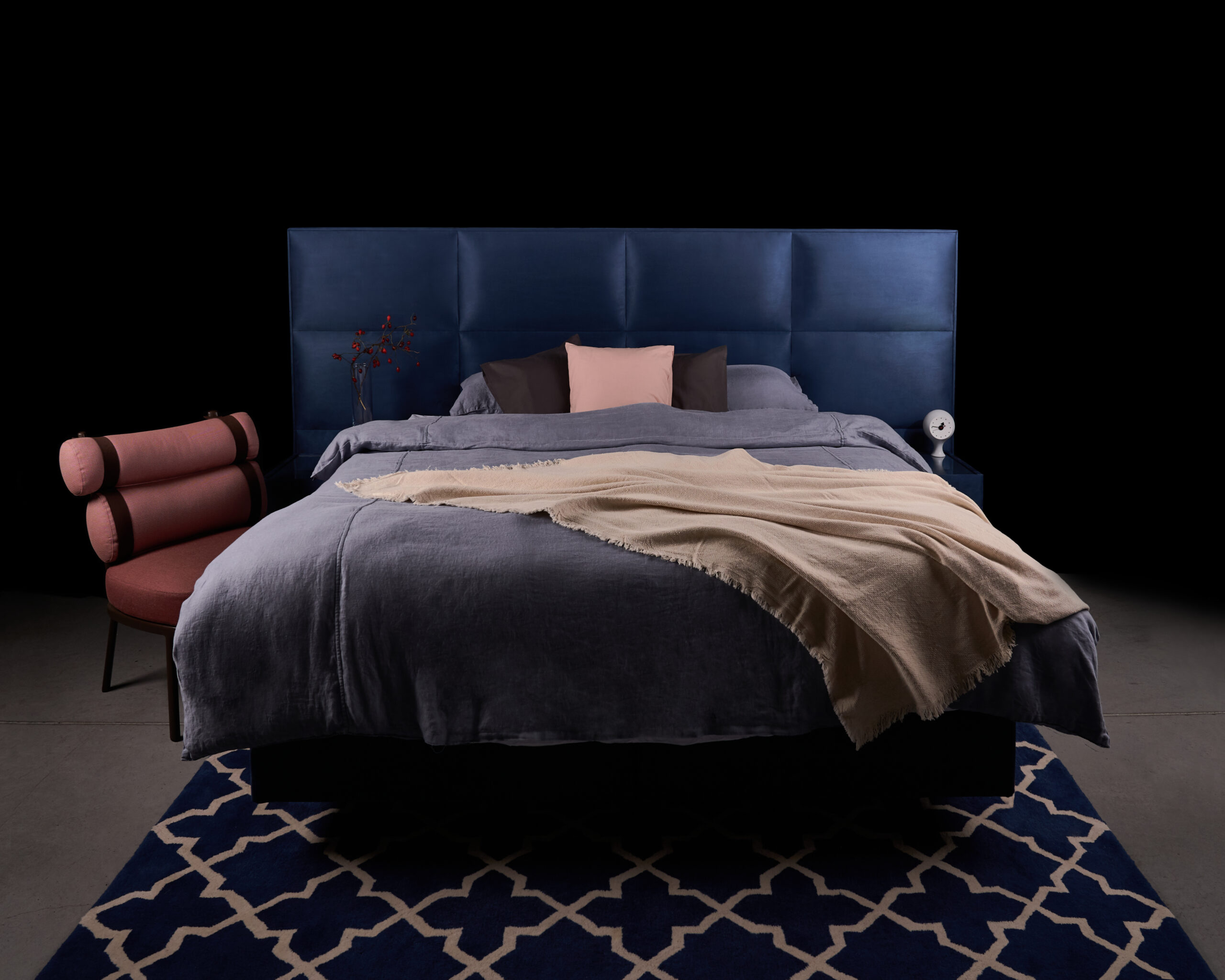 Divan bed with high mattress and topper in a dark bedroom – replacing the mattress with a new one